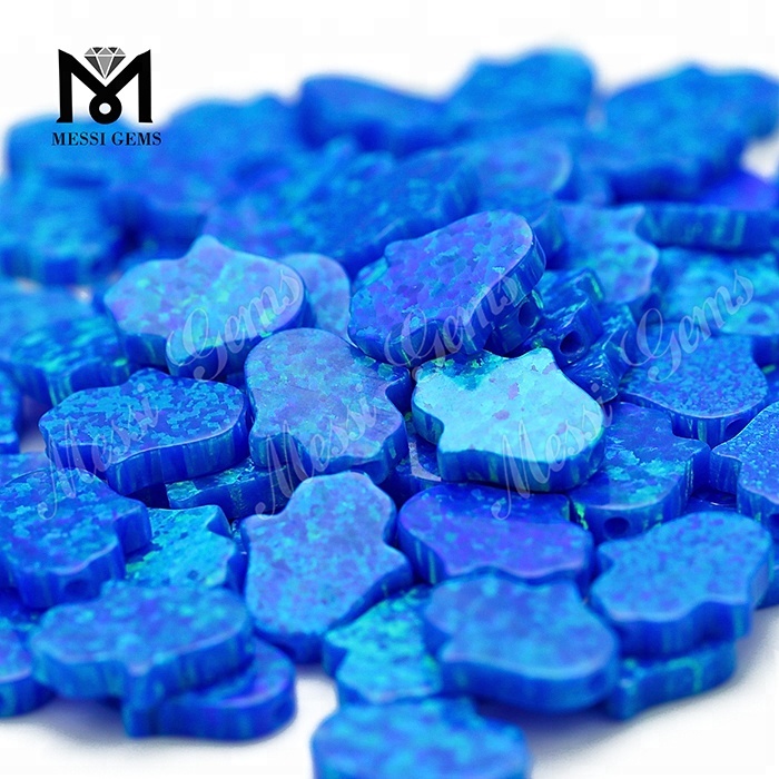 Blue 11 x 13 x 2.5 mm Lab Created Synthetic Opal Hamsa Stone