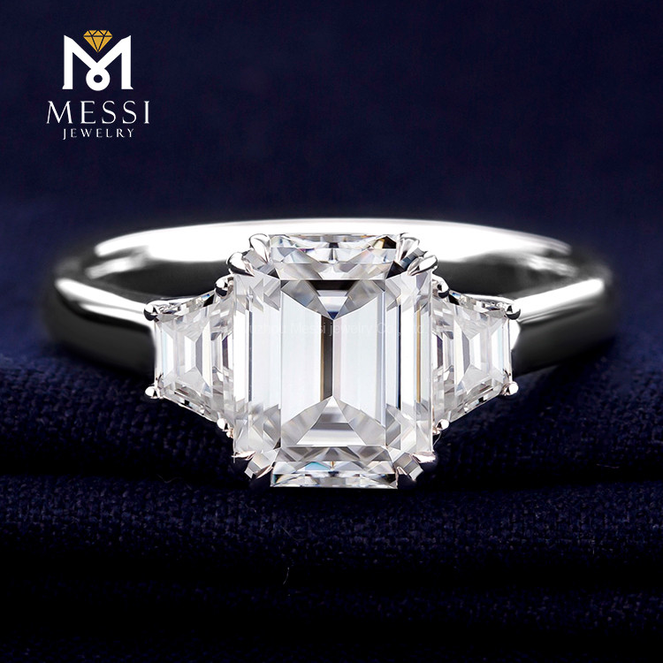 three stone emerald engagement ring